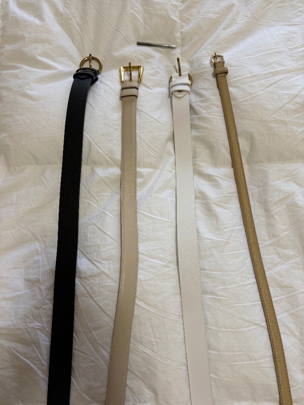 Four belt bundle with hole puncher tool